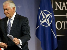 U.S. Secretary of State Rex Tillerson walks off the podium after addressing a media conference at NATO headquarters in Brussels on Wednesday, Dec. 6, 2017. U.S. Secretary of State Rex Tillerson and his NATO counterparts held talks on Georgia and counter-terrorism efforts on Wednesday, the final day of their two-day meeting in Brussels.