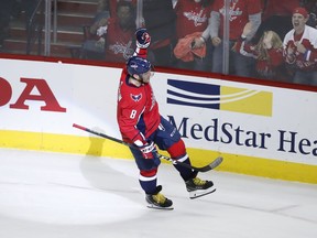 Washington Capitals left wing Alex Ovechkin (8), from Russia, celebrates the only goal of the shootout in an NHL hockey game against the Boston Bruins, Thursday, Dec. 28, 2017, in Washington. The Capitals won 4-3.