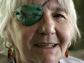 FILE - In this June 27, 2007 file photo, JoAnna McKee poses in Seattle. McKee, a pioneering medical marijuana activist in Washington state, died Nov. 18, 2017. She was 74. McKee was instrumental in working to pass Washington's medical marijuana initiative and pushing lawmakers to support patients.