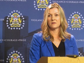 Calgary Police Staff Sgt. Melanie Oncescu speaks to reporters in Calgary on Dec. 21, 2017, about 49 charges being laid against a Calgary man who allegedly sexually assaulted 22 underage victims.