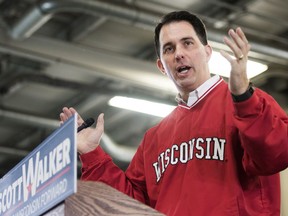 FILE - In this Nov. 7, 2017, file photo, Wisconsin Gov. Scott Walker addresses supporters at Mid-State Equipment in Janesville, Wis. Walker moved ahead Monday, Dec. 4, 2017, with his plans to make Wisconsin the first state to drug test able-bodied adults applying for food stamps, a move blocked by the federal government or found to be unconstitutional when other states have tried.