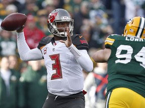 Tampa Bay Buccaneers' Jameis Winston throws during the first half of an NFL football game against the Green Bay Packers Sunday, Dec. 3, 2017, in Green Bay, Wis.