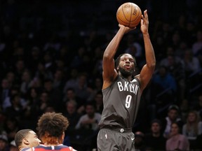Brooklyn Nets forward DeMarre Carroll shoots a three-pointer against the Washington Wizards on Dec. 12.