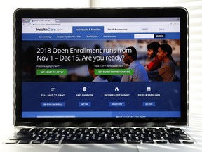 In this Oct. 18, 2017 photo, the Healthcare.gov website is seen on a computer screen in Washington. The government says about 8.8 million people have signed up for coverage next year under the Affordable Care Act. A deadline surge last week appears to account for the surprisingly strong numbers.