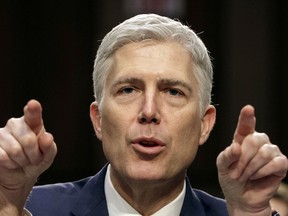 FILE - In this March 22, 2017, file photo, then-Supreme Court nominee Judge Neil Gorsuch speaks during his confirmation hearing, on Capitol Hill in Washington. Donald Trump's unpredictable, pugnacious approach to the presidency often worked against him as Republicans navigated a tumultuous but ultimately productive year in Congress.