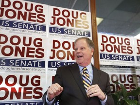 In this Dec. 10, 2017, photo, Doug Jones speaks during a campaign rally in Birmingham, Ala. Jones, a Democrat who once prosecuted two Ku Klux Klansmen in a deadly church bombing and has now broken the Republican lock grip on Alabama, is the state's new U.S. senator.