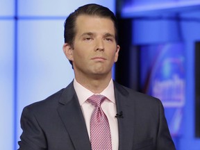 FILE - In this July 11, 2017, file photo, Donald Trump Jr. is interviewed by host Sean Hannity on his Fox News Channel television program, in New York. An email sent to President Donald Trump and Donald Trump Jr. before the 2016 election included a decryption key for hacked documents that the website WikiLeaks had made public a day earlier. The email obtained by The Associated Press was sent to Trump and his eldest son on Sept. 14, 2016, the day after WikiLeaks had released the emails publicly on its Twitter account.