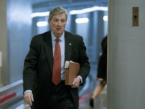 In this Dec. 19, 2017, photo, Sen. John Kennedy, R-La., arrives on Capitol Hill in Washington. Kennedy, the Republican senator who became an Internet sensation with his rapid-fire takedown of President Donald Trump's judicial nominee received an unexpected call _ from the president. "He said, 'look, Kennedy, do your job. I'm not upset or angry. I'll never criticize you for doing what you think is right,'" recalled Kennedy of last week's phone conversation.