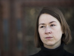 In this Sunday, Dec. 17, 2017, photo, Professor Celeste Kidd is photographed at University of Rochester, in Rochester, N.Y. When Kidd was a graduate student at the University of Rochester she says a professor supervising her made her life unbearable by stalking her, making demeaning comments about her weight and talking about sex. Ten years on and now a professor of neuroscience at the university, Kidd is taking legal action. She has filed a federal lawsuit against the school alleging that it mishandled its sexual harassment investigation into the professor's actions and then retaliated against her and her colleagues for reporting the misconduct.