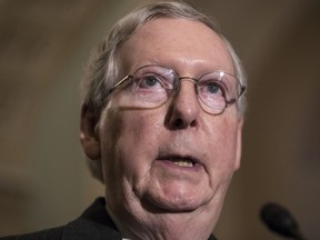 In this Dec. 5, 2017, photo, Senate Majority Leader Mitch McConnell, R-Ky., speaks on Capitol Hill in Washington. The pace of confirmations for President Donald Trump's judicial nominees has quickly become a source of pride for Senate Majority Leader Mitch McConnell and fellow Republicans while Democrats are ruing the day they changed the rules to make it easier to fast-track court picks.
