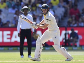 Australia's Shaun Marsh bats against England during their Ashes cricket test match in Melbourne, Australia, Tuesday, Dec. 26, 2017.