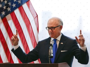United States ambassador to the Court of St James Woody Johnson speaks during a press preview at the new United States embassy building near the River Thames in London, Wednesday, Dec. 13, 2017. The new embassy which is being funded by the sale of existing property in London is expected to cost around 1 billion US dollars.