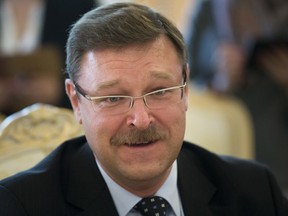 FILE - In this June 20, 2014 file photo, Konstantin Kosachev, head of a government agency in charge of relations with ex-Soviet nations, speaks at a news conference in Moscow, Russia. Kosachev said on Tuesday, Dec. 5, 2017 that he can't understand why President Donald Trump's former national security adviser Michael Flynn failed to immediately reveal the truth about his contacts with the Russian ambassador.