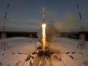 FILE - In this Tuesday, Nov. 28, 2017 file photo, a Russian Soyuz 2.1b rocket carrying the Meteor M satellite and additional 18 small satellites lifts off from the launch pad at the new Vostochny cosmodrome outside the city of Tsiolkovsky, about 200 kilometers (125 miles) from the city of Blagoveshchensk in the far eastern Amur region, Russia. The Kremlin says authorities are looking into recent failures in Russia's space industry.