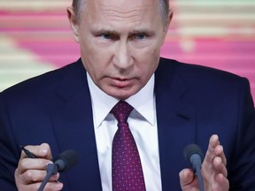 FILE In this file photo taken on Thursday, Dec. 14, 2017, Russian President Vladimir Putin gestures during his annual news conference in Moscow, Russia. After 18 years as Russia's leader _ and with another six-year term sure to follow a March election _ Putin doesn't show the appetites or vulnerabilities that can personalize Western politics, even when staged or spun. If he has moments of merriment or melancholy, they happen in private.