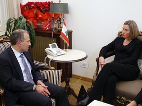 Lebanese Foreign Minister Gibran Bassil, left, meets with European Union Foreign Policy Chief Federica Mogherini, right, at the Lebanese foreign ministry in Beirut, Lebanon, Tuesday, Dec. 19, 2017. A senior European Union official has reaffirmed EU strong support to Lebanon's stability and security during meetings with Lebanese officials.