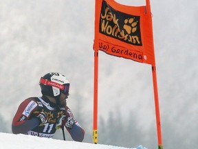 Norway's Kjetil Jansrud waits on the course as the training was interrupted due to fog during alpine ski, men's World Cup downhill training, in Val Gardena, Italy, Thursday, Dec. 14, 2017.