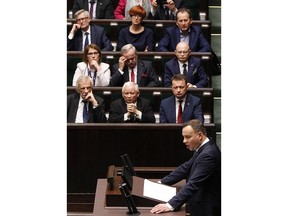 Poland's President Andrzej Duda gives a ceremonial speech to the National Assembly, the joint houses of parliament, in Warsaw, Poland, Tuesday, Dec. 5, 2017, to open a year of observances that will lead up to the 100th anniversary of Poland's regaining of independence, a historic fact that the current government holds very important for national identity.