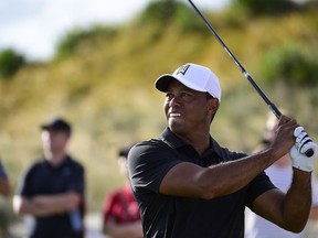 Tiger Woods tees off from hole 16 during the Hero World Challenge golf tournament at Albany Golf Club in Nassau, Bahamas, Thursday, Nov. 30, 2017.