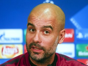 Manchester City manager Pep Guardiola speaks during a news conference in Kharkiv, Ukraine, Tuesday, Dec. 5, 2017. Manchester City will face Shakhtar Donetsk in Group F Champions League soccer match at the Metalist Stadium on Wednesday.