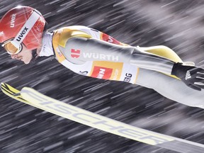 Richard Freitag of Germany soars through the air during the men's ski jumping FIS World Cup at the Titlisschanze in Engelberg, Switzerland, on Saturday, Dec. 16, 2017.