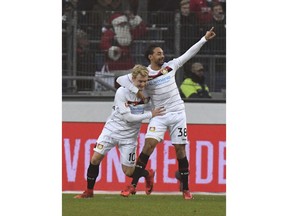 Leverkusen's Julian Brandt celebrating his opening goal along with teammate Karim Bellarabi, right, during the German Bundesliga soccer match between Hannover 96 and Bayer Leverkusen in Hannover, Germany, Sunday, Dec. 17, 2017.