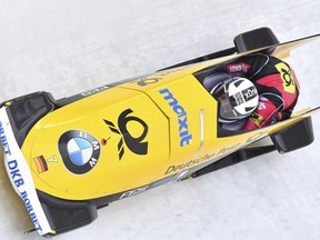 Mariama Jamanka and Lisa Marie Buckwitz of Germany speed down the track during their first run of the women's  bobsled World Cup race in Innsbruck, Saturday, Dec. 16, 2017.