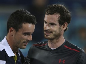 Great Britain's Andy Murray, right, congratulates to Spain's Roberto Bautista Agut after their match during the second day of the Mubadala World Tennis Championship in Abu Dhabi, United Arab Emirates, Friday, Dec. 29, 2017.