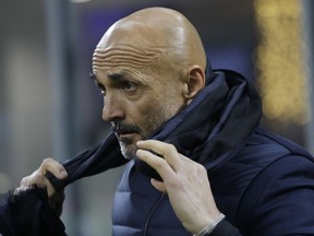 Inter Milan coach Luciano Spalletti waits for the kick-off of the Italian Cup soccer match between Inter Milan and Pordenone at the San Siro stadium in Milan, Italy, Tuesday, Dec.12, 2017.