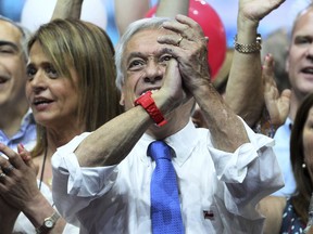 Sebastian Pinera, former Chilean president who is running for reelection, applauds during his closing campaign rally in Santiago, Chile, Thursday, Dec. 14, 2017. Pinera will face rival candidate Alejandro Guillier in the Dec. 17 presidential runoff election.