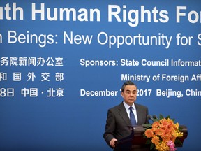 Chinese Foreign Minster Wang Yi speaks during the South-South Human Rights Forum at the Great Hall of the People in Beijing, Thursday, Dec. 7, 2017. China opened a human rights forum attended by developing countries Thursday in its energetic drive to showcase what it considers the strengths of its authoritarian political system under President Xi Jinping.