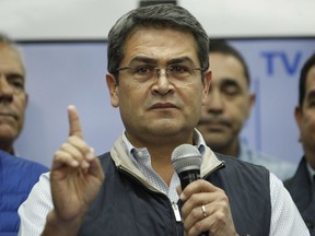 Honduran President Juan Orlando Hernandez gives a press conference in Tegucigalpa, Honduras, Tuesday, Dec. 5, 2017. Hernandez holds a narrow lead in the official results for the presidential election from the Supreme Electoral Tribunal, a count that his rival Salvador Nasralla has claimed was fraudulent and is refusing to recognize.