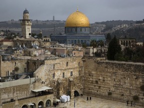 A view of the Western Wall and the Dome of the Rock, some of the holiest sites for for Jews and Muslims, is seen in Jerusalem's Old City, Wednesday, Dec. 6, 2017. U.S. officials say President Donald Trump will recognize Jerusalem as Israel's capital Wednesday, Dec. 6, and instruct the State Department to begin the multi-year process of moving the American embassy from Tel Aviv to the holy city. His decision could have deep repercussions across the region.
