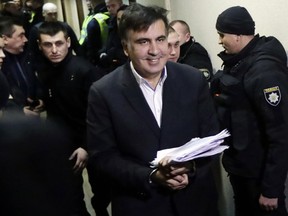 Former Georgian President Mikheil Saakashvili arrives at a court in Kiev, Ukraine, Monday, Dec. 11, 2017. Mikheil Saakashvili, the adamant opposition leader who was stripped of his Ukrainian citizenship four months ago, was arrested late Friday, Dec. 8, in Ukraine's capital.