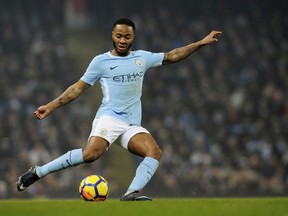 Manchester City's Raheem Sterling attempts a shot at goal during the English Premier League soccer match between Manchester City and Tottenham Hotspur at Etihad stadium, in Manchester, England, Saturday, Dec. 16, 2017.