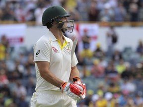 Australia's Mitchell Marsh leaves the ground after being dismissed on the second ball of the day from England during the fourth day of their Ashes cricket test match in Perth, Australia, Sunday, Dec. 17, 2017.