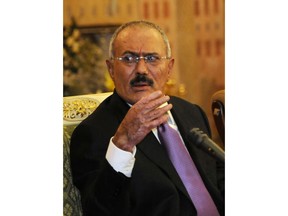 FILE - In this Dec. 24, 2011 file photo, Yemen's President Ali Abdullah Saleh gestures with a hand burned in a bombing, as he speaks during a news conference at the Presidential Palace in Sanaa, Yemen. Saleh was killed Monday, Dec. 4, 2017, by Shiite rebels with whom he had once been allied. It was a grisly end for a leader who ruled for more than 30 years by shifting alliances and playing multiple sides in the many conflicts that plagued his impoverished nation. Even after his ouster in 2012, he remained a power player driving the civil war that has brought Yemen to ruinous collapse.