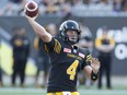 In this July 15, 2017 file photo, Hamilton Tiger-Cats quarterback Zach Collaros passes against the B.C. Lions.