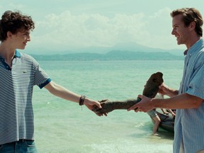 Actors Timothee Chalamet (left) as Elio and Armie Hammer as Oliver are shown in a scene from the film "Call Me By Your Name."