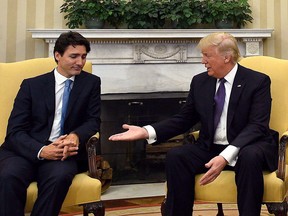 Prime Minister Justin Trudeau meets with US President Donald Trump in the Oval Office of the White House in Washington, DC on Monday, Feb. 13, 2017.