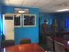 North Korean soldiers stand guard on their side of a Joint Security Area conference room.