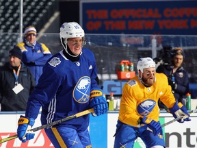 Jack Eichel, left, and Ryan O'Reilly of the Buffalo Sabres practise at Citi Field on Sunday. The team will take part in the 2018 NHL Winter Classic on New Year's Day.