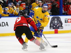 In this Jan. 5 file photo, Swedish defenceman Rasmus Dahlin, the likely No. 1 pick in the 2018 NHL draft, takes a shot against Canada in the world junior gold-medal game in Buffalo.