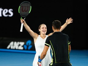 Gabriela Dabrowski of Canada and Mate Pavic of Croatia celebrate after winning the mixed doubles final against Rohan Bopanna of India and Timea Babos of Hungary on day 14 of the 2018 Australian Open at Melbourne Park on January 28, 2018 in Melbourne, Australia.