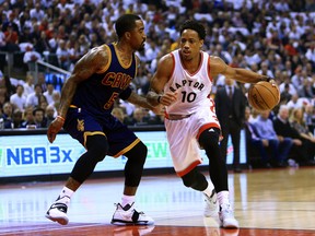 In this May 5, 2017 file photo, Toronto Raptors guard DeMar DeRozan drives on Cleveland Cavaliers guard J.R. Smith in the Eastern Conference playoffs.