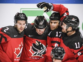 Canadian players celebrate a Matt Ellison (20) goal against the Czech Republic at the Channel One Cup in Moscow on Dec. 15, 2017.