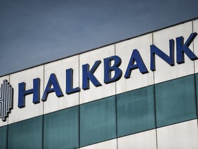 This file photo taken on December 2, 2017 shows the logo of the Turkish Halkbank in Istanbul.  A Turkish banker was convicted in New York on January 3, 2018 in connection with a massive scheme to help Iran evade US sanctions, in a case that strained ties between Ankara and Washington.