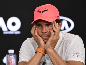 Rafael Nadal attends a press conference after retiring in the fifth set against Marin Cilic in their quarter-final match on Day 9 of the Australian Open on Jan. 23, 2018.
