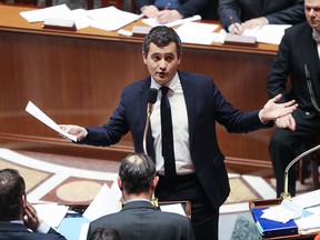 In this file photo taken on January 24, 2018 at the National Assembly in Paris French Minister of Public Action and Accounts Gerald Darmanin speaks during a session of questions to the government.