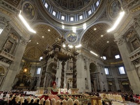 Pope Francis, from beneath the baldachin, celebrates an Epiphany Mass in St. Peter's Basilica at the Vatican, Saturday, Jan. 6, 2018. Francis, in a homily Saturday to mark Epiphany, said people are "often make do" with having "health, a little money and a bit of entertainment."